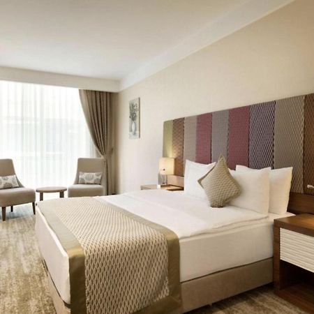 Отель Ramada By Wyndham Gemli̇K Гемлик Экстерьер фото